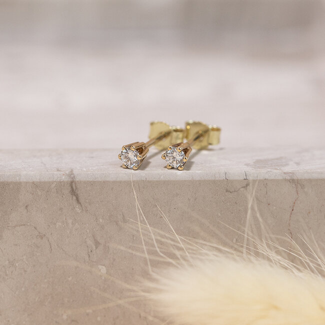 Goldene Solitär-Ohrstecker mit Diamant 14 Karat