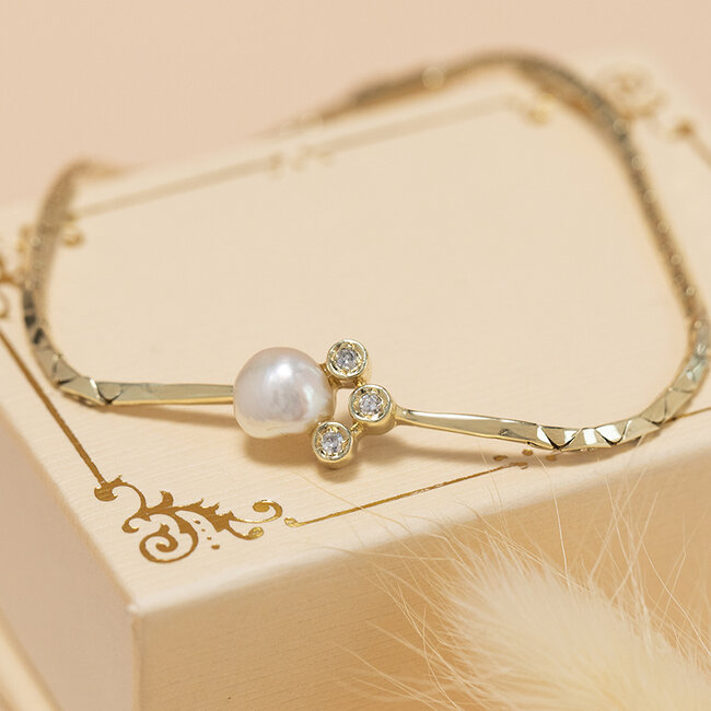Gouden armband met parel en diamant 17.5 cm 14 karaat