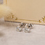 Witgouden solitair oorstekers met diamant 14  karaat