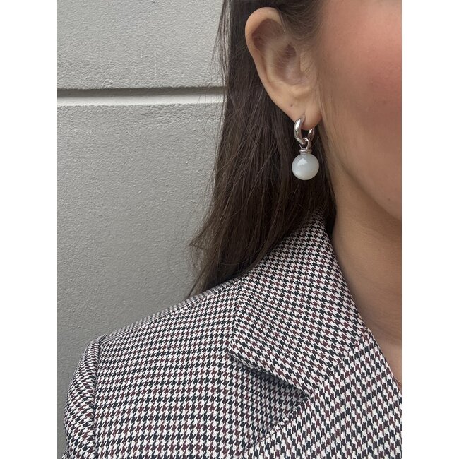 White gold hinged hoop earrings from Bron Jewelry 14 karat