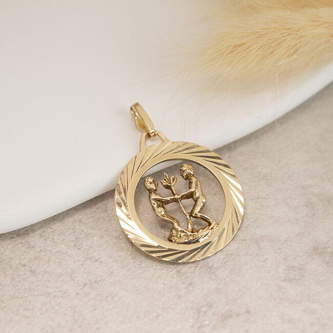 Golden zodiac pendant Gemini 14 karat