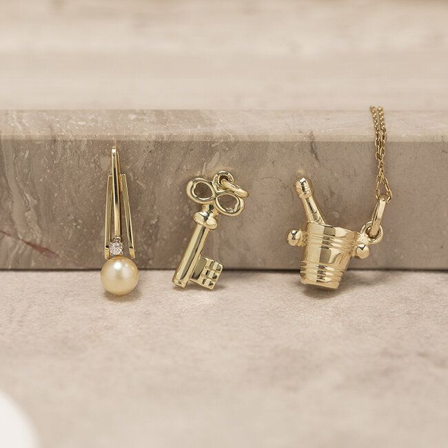 Gold pendant champagne in ice bucket 14 karat