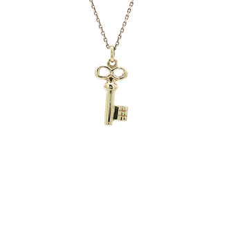 Gold key pendant