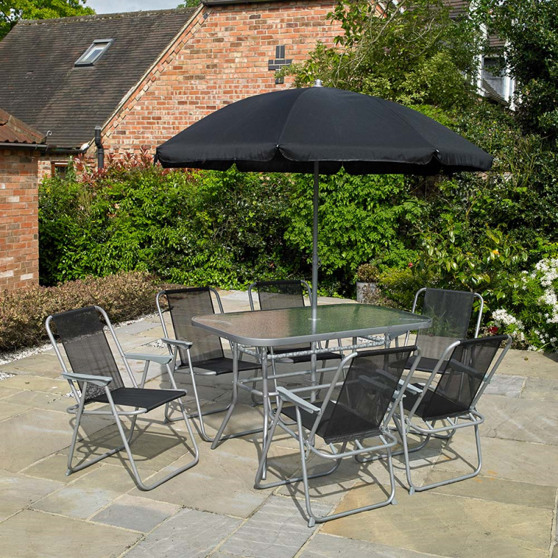 garden chairs table and parasol