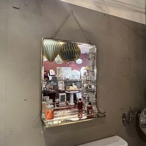 Mirror with foldable shelf brass