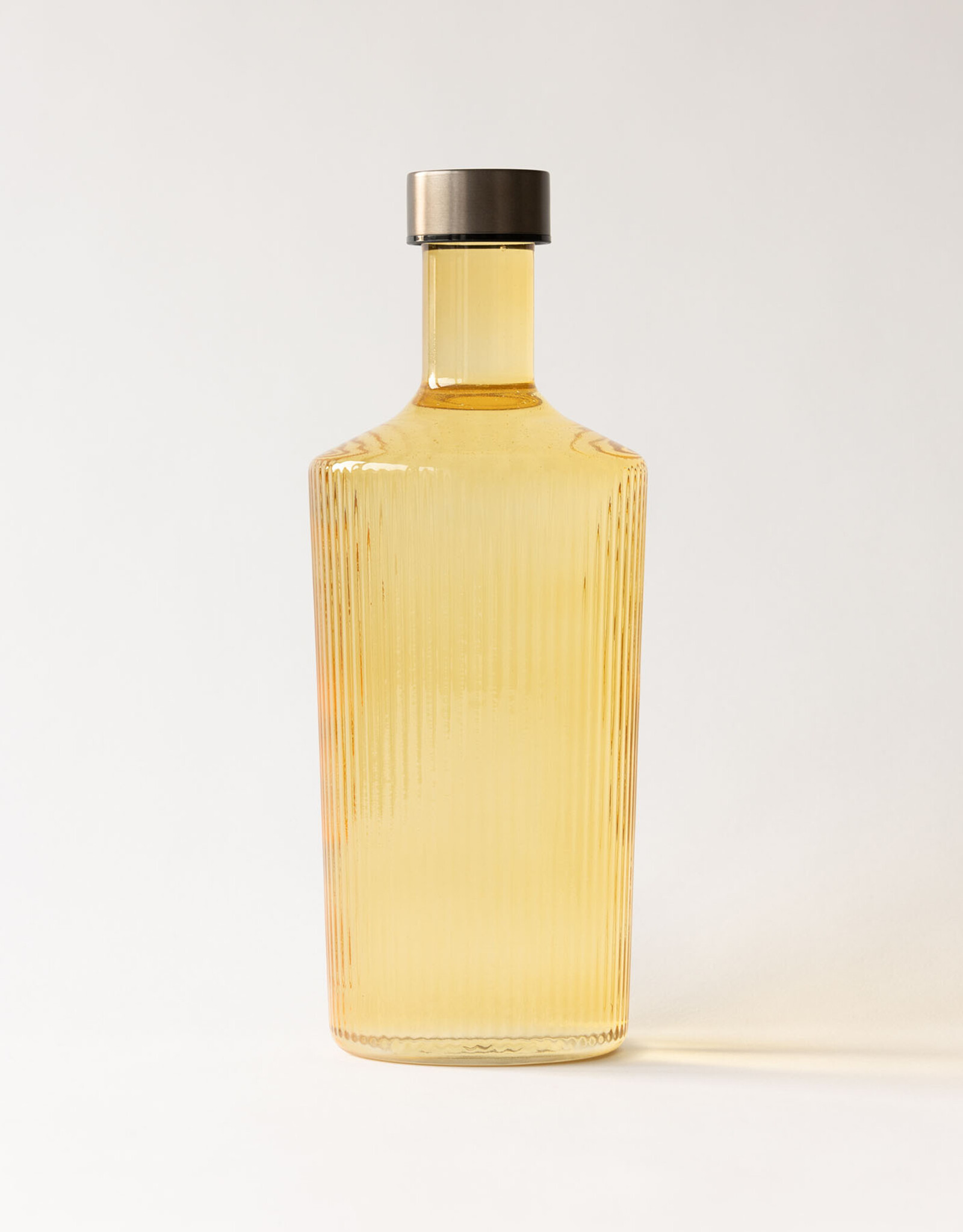 Paveau Waterfles - Yellow - ribbels