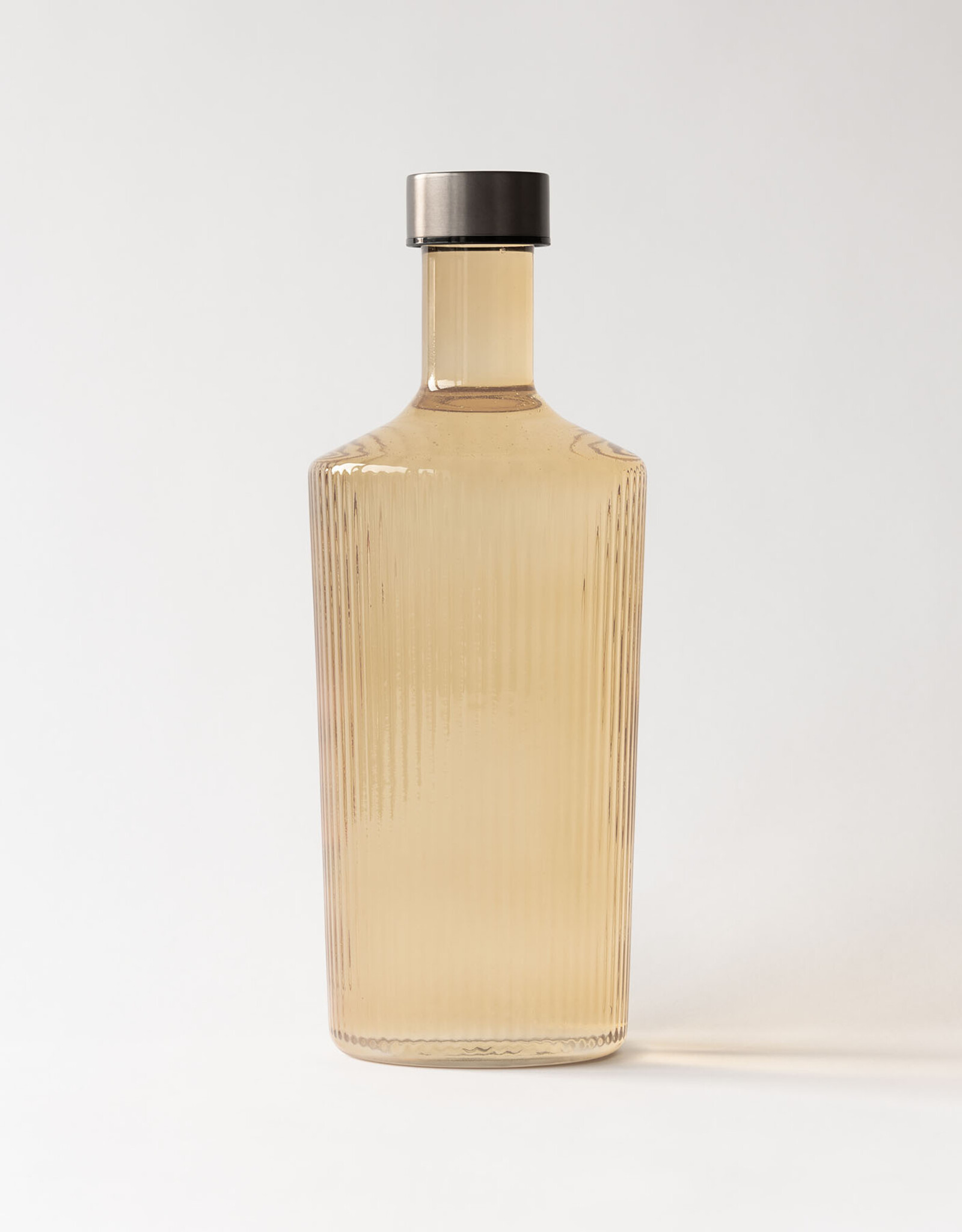 Paveau Waterfles - Bells  champagne - ribbels