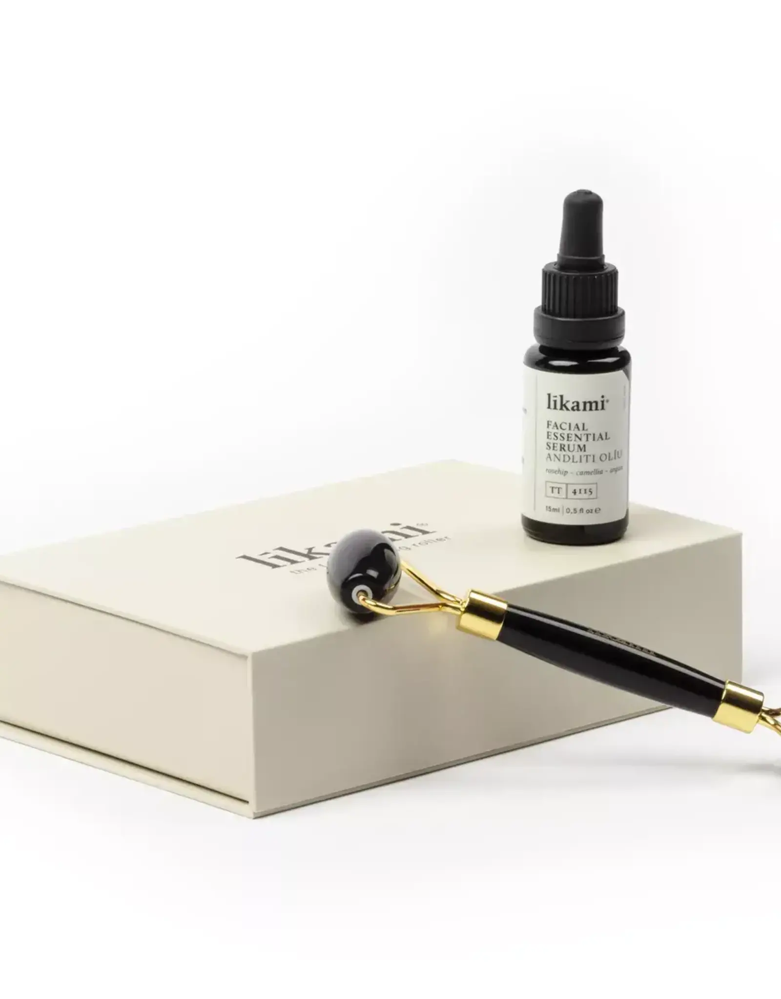 likami Set - Facial essential serum 15 ml + stone roller