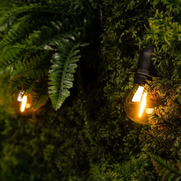Ledvion 15m LED Lichterkette + 3m Anshlusskabel - E27 - 2100K - IP65 - Verknüpfbar - inkl. 15 LEDs - Geeignet für den Innen- und Außenbereich