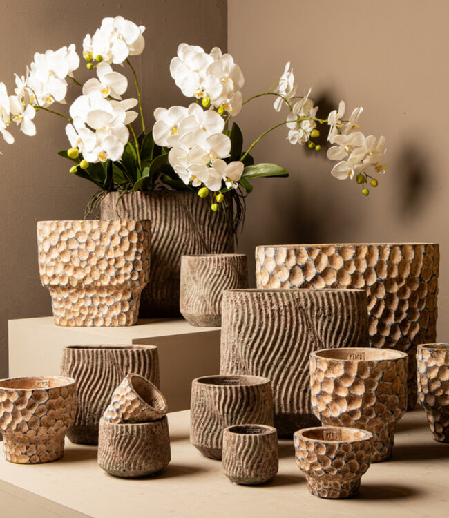 PTMD Diesel Grijze ovale cementen pot met golvende lijnen ruw M