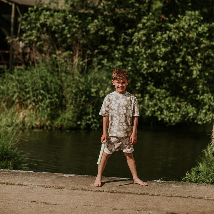 Koko Noko jongens zwembroek zand bloem geel | N58857-37