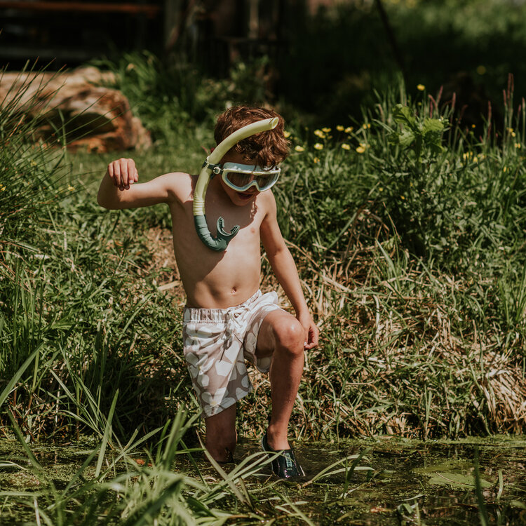 Koko Noko jongens zwembroek zand bloem geel | N58857-37