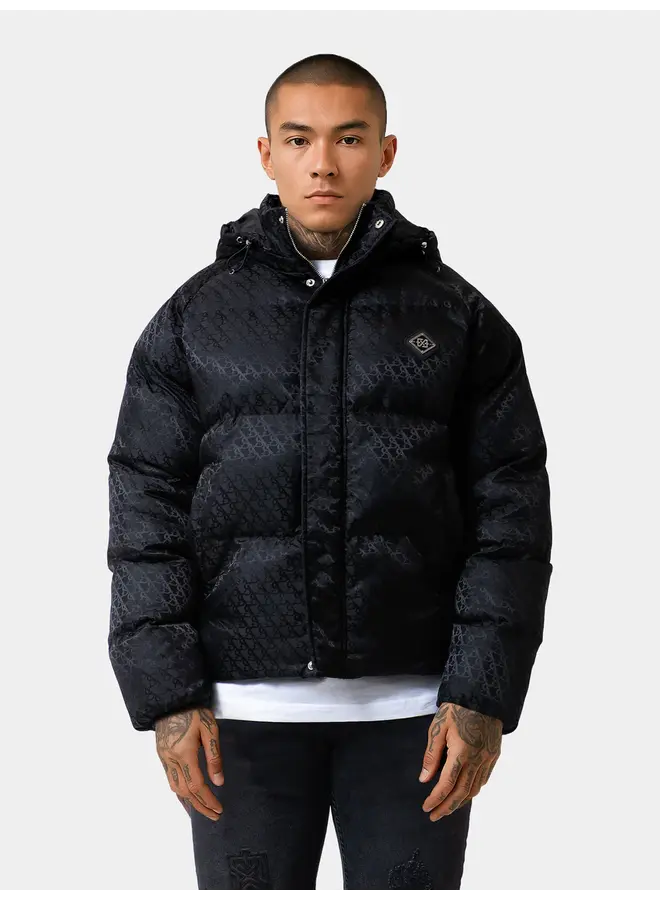 XPLCT STUDIOS AW25 - Mono Puffer Jacket - Black Monogram