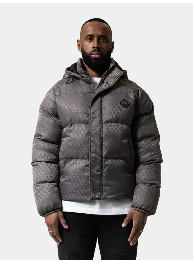 XPLCT STUDIOS AW25 - Mono Puffer Jacket - Grey Monogram