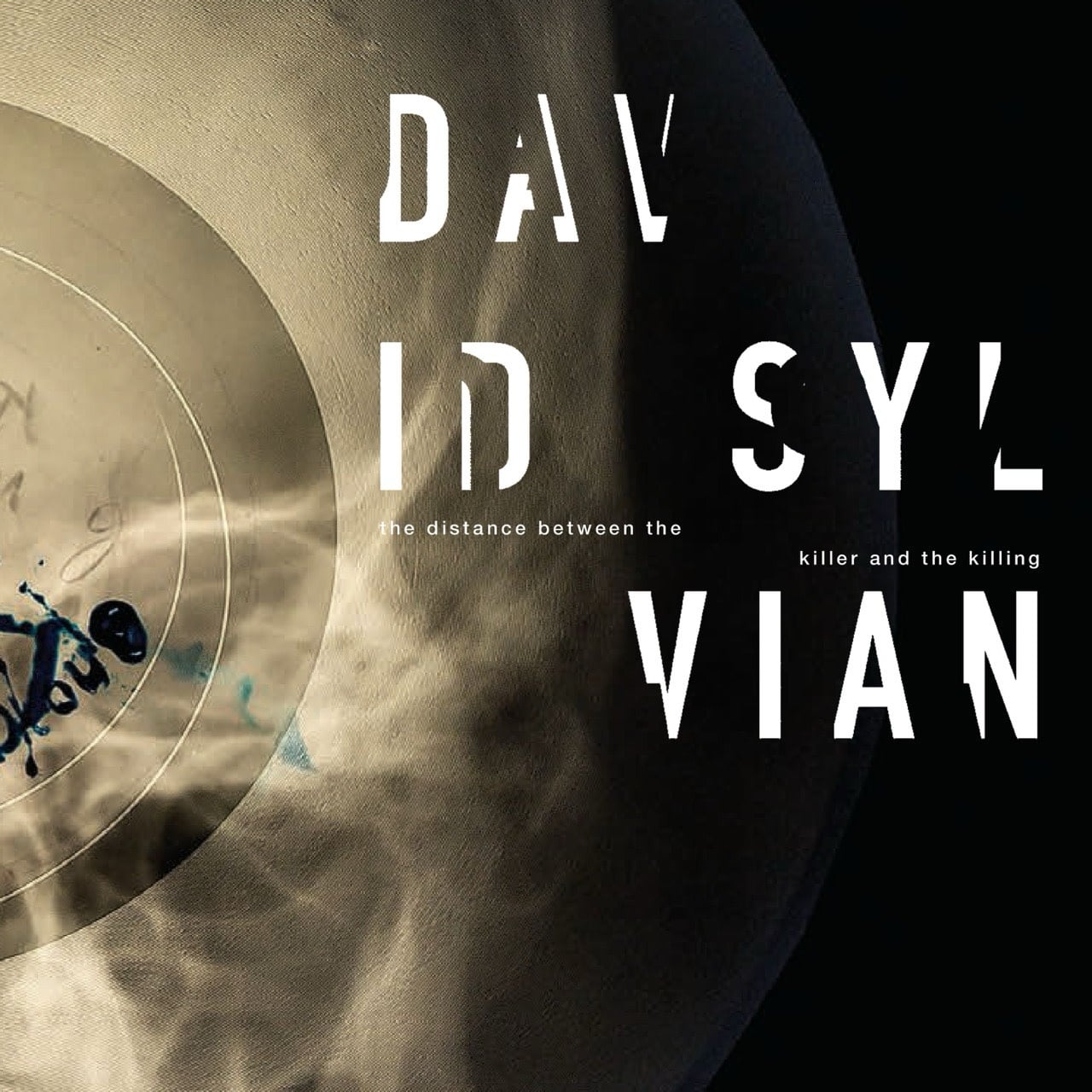 NANOQ David Sylvian - The Distance Between the Killer and the Killing