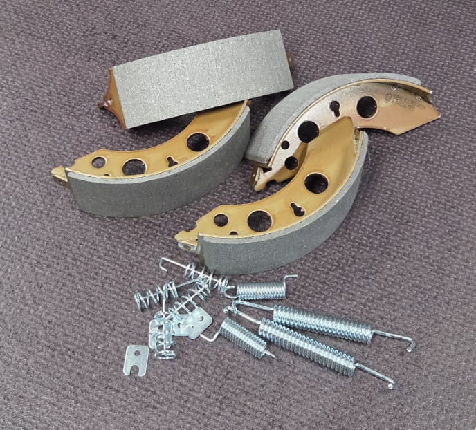 Trailer brake shoes with springs and fitting hardware
