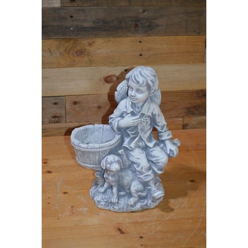 Plantenbakje met jongetje en hond 