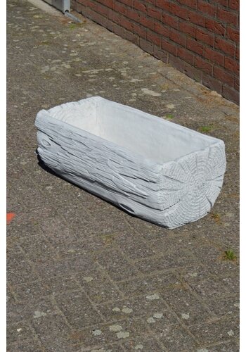 Betonnen bloembak boomstam 