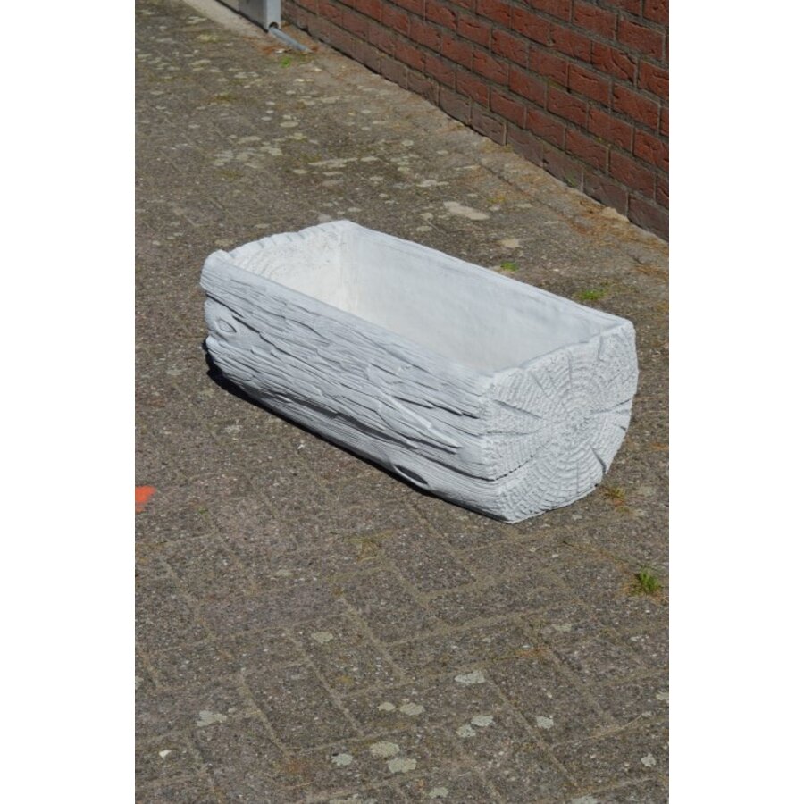 Betonnen bloembak of plantenbak in de vorm van een boomstam-1