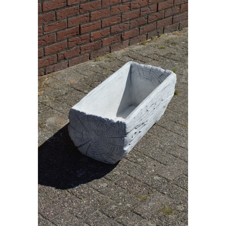 Betonnen bloembak of plantenbak in de vorm van een boomstam-3