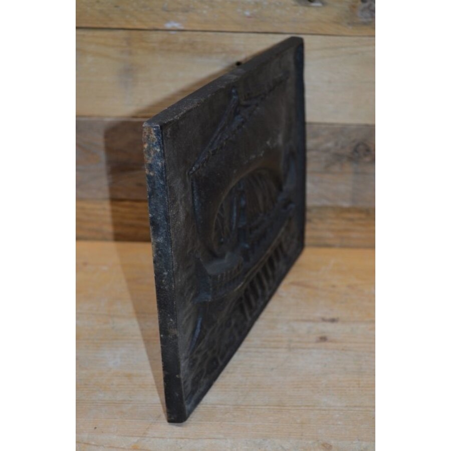 Gietijzeren kachelplaat met een oud schip-2