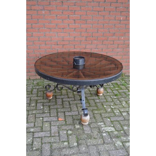 Karrewiel eettafel met glazen blad 