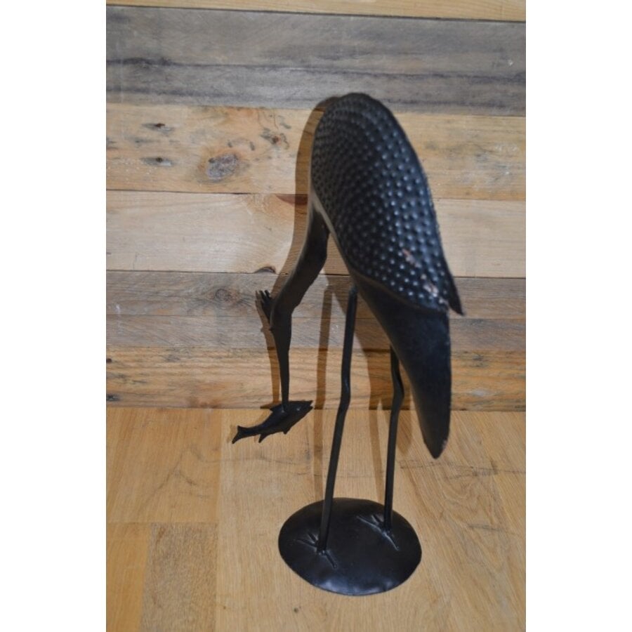 Metalen vogel met vis-4