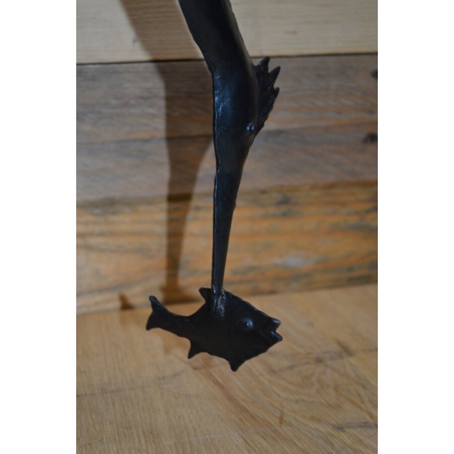 Metalen vogel met vis-7