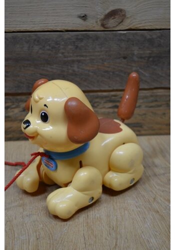 Vintage trekhondje aan een koord 