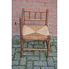 LoodsVol, Tweedehands Retro Bobbin hoekstoel van eikenhout met biezen zitting