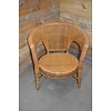 LoodsVol, Tweedehands Vintage ronde rotan fauteuil met opengewerkt vlechtwerk en ruitpatroon