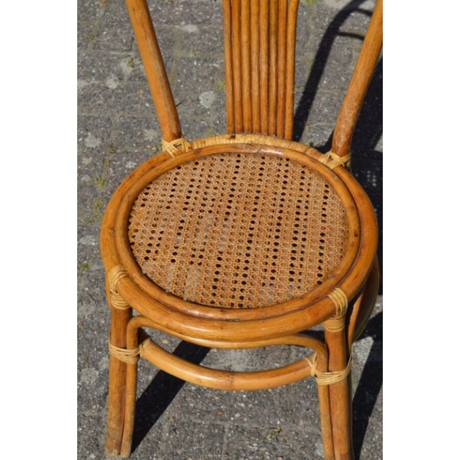 Rotan stoeltje met pauwenstaart waaier boog-5