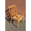 LoodsVol, Tweedehands Tweedehands houten armstoel met spijlen rugleuning en touw zitting