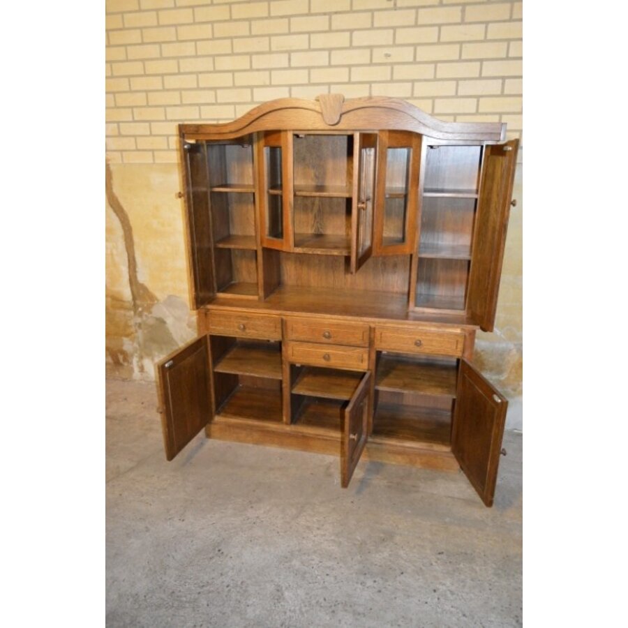 Donker eiken buffet- of wandkast met buffeltoog, laden en kastjes-4