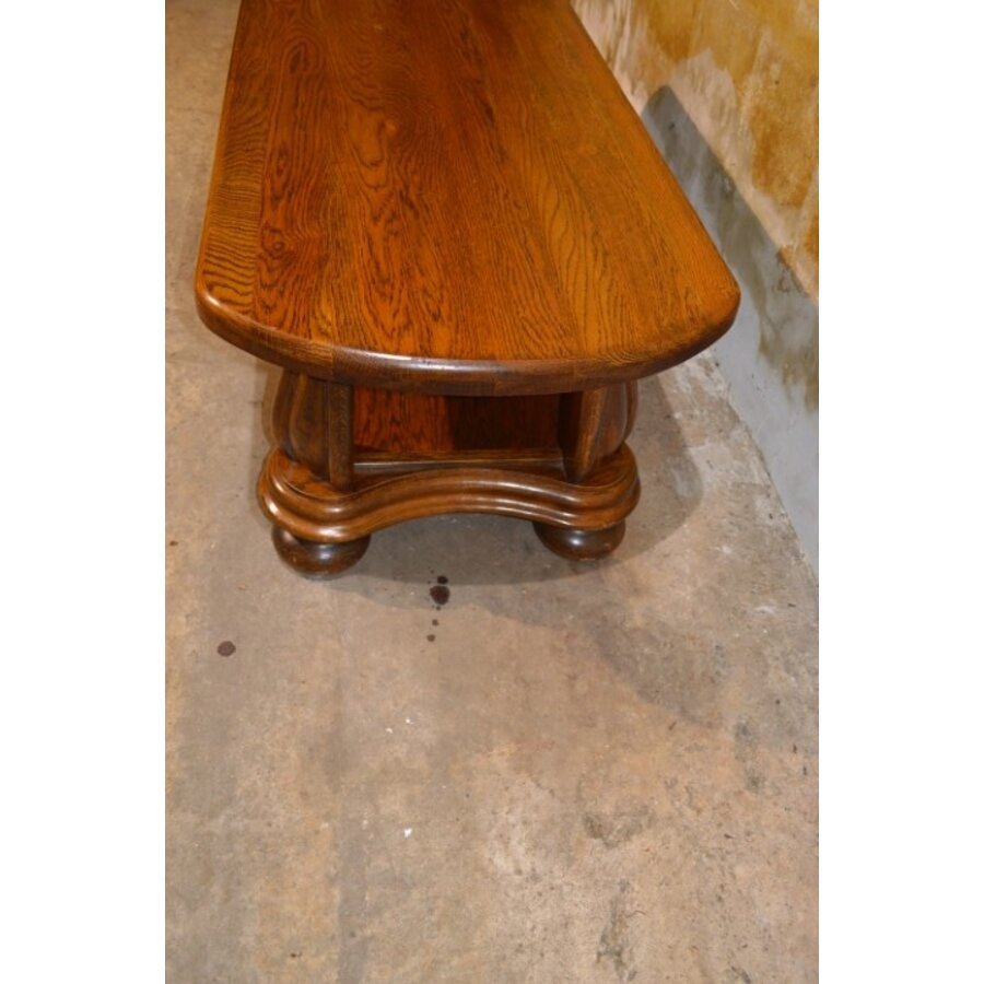 Massief eiken salontafel met ovaal blad en gebogen poten-6