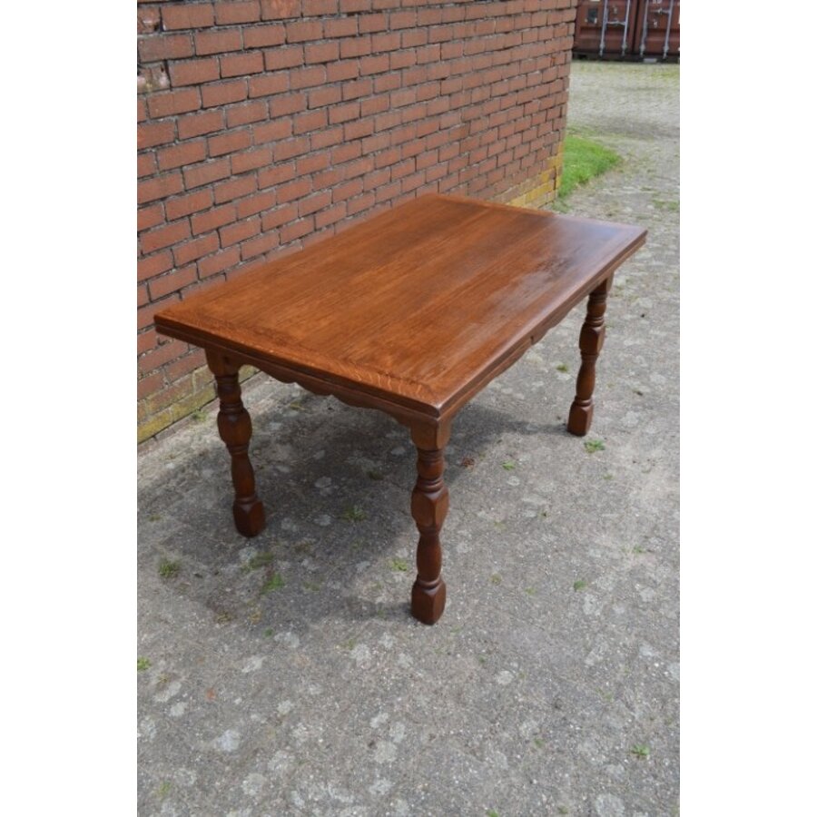 Donker eiken uitschuifbare eettafel met vaste poten-1