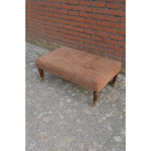 Vintage hocker op wieltjes 