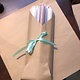 A package with 10 pastel coloured candles