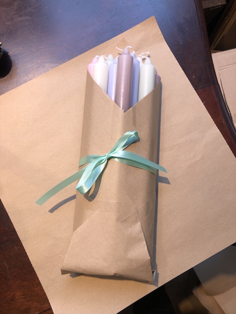 A package with 10 pastel coloured candles