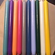 A package with 10 candles in 10  different colours