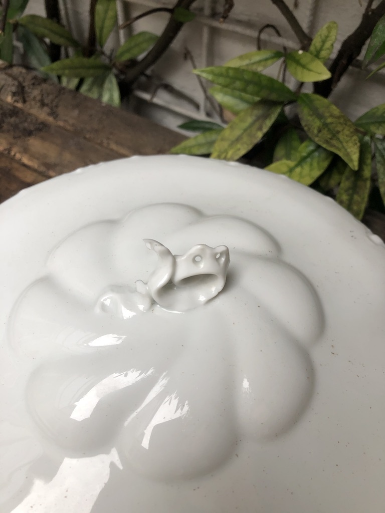 White covered dishes, porcelain