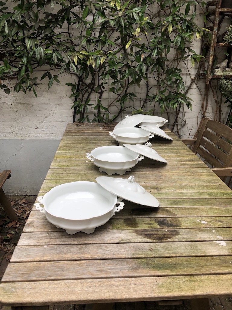 White covered dishes, porcelain