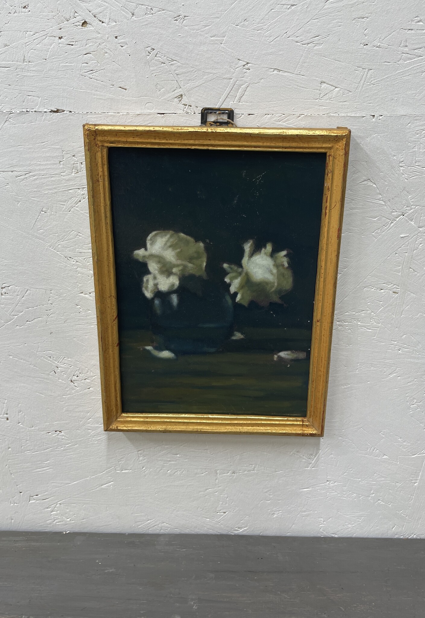Painting of roses on a dark background