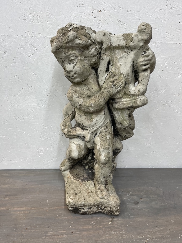 Antique garden statue, little guy with harp