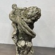 Antique garden statue, little guy with harp