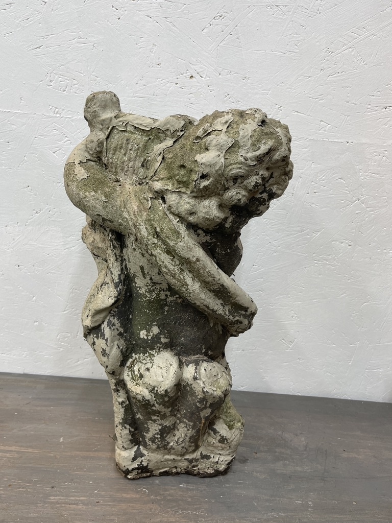 Antique garden statue, little guy with harp