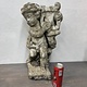 Antique garden statue, little guy with harp