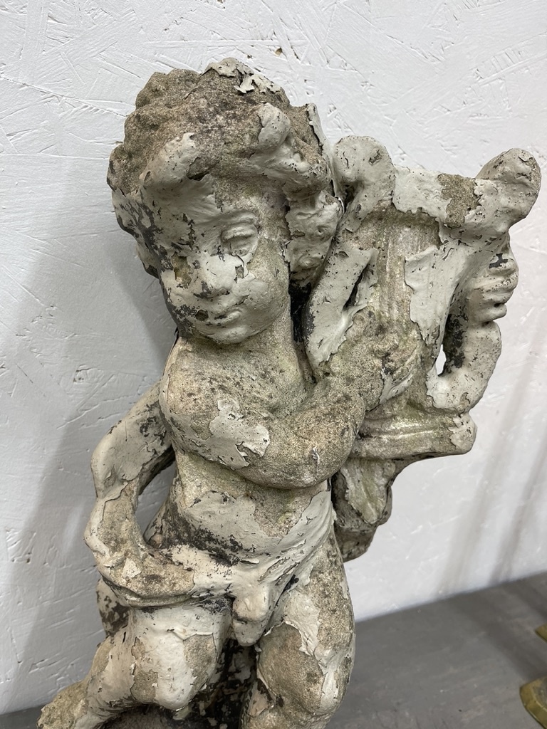 Antique garden statue, little guy with harp