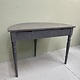 Antique semi-lunar table
