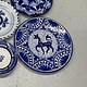 Vintage aardewerk schotel met beest in het midden